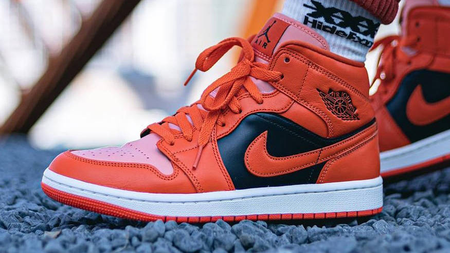 Jordan 1 mid orange on sale black