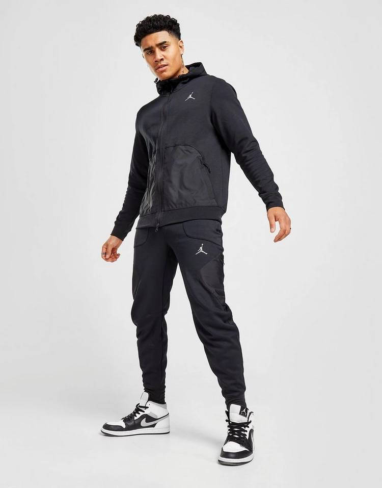 https://cms-cdn.thesolesupplier.co.uk/2022/04/jordan-statement-full-zip-hoodie-black-front.jpg