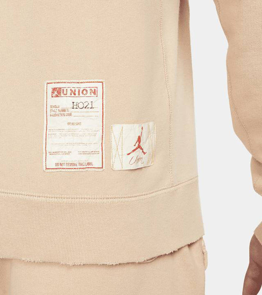 Jordan x UNION Fleece Crew Peach branding