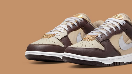 This Neutral-Hued Nike Dunk Low Comes With a Side of Bling This Neutral-Hued Nike Dunk Low Comes With a Side of Bling