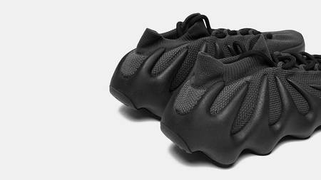 The Yeezy 450 "Utility Black" Gets the "Triple Black" Treatment The Yeezy 450 "Utility Black" Gets the "Triple Black" Treatment
