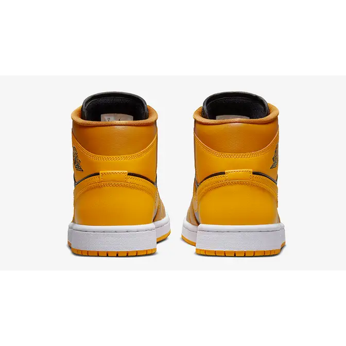 Nike air jordan 1 mid best sale university gold