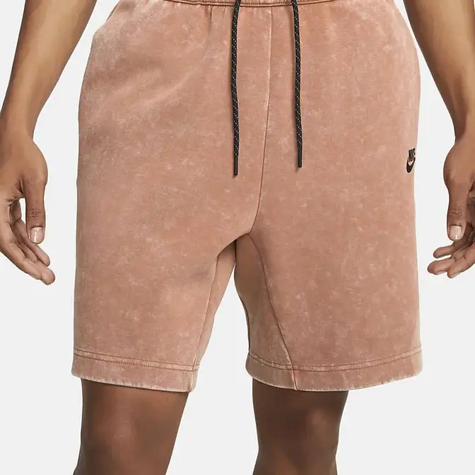 Pink nike tech fleece shorts online