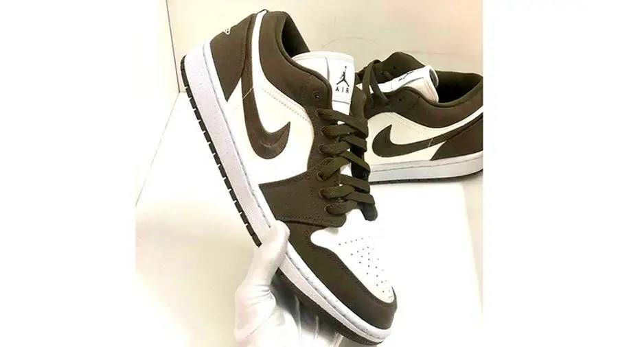 brown and white low jordans