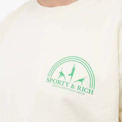 Sporty & Rich Fitness Group Crew Sweat Cream logo