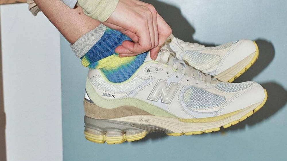 Image via AURALEE Auralee x New Balance 2002R 2