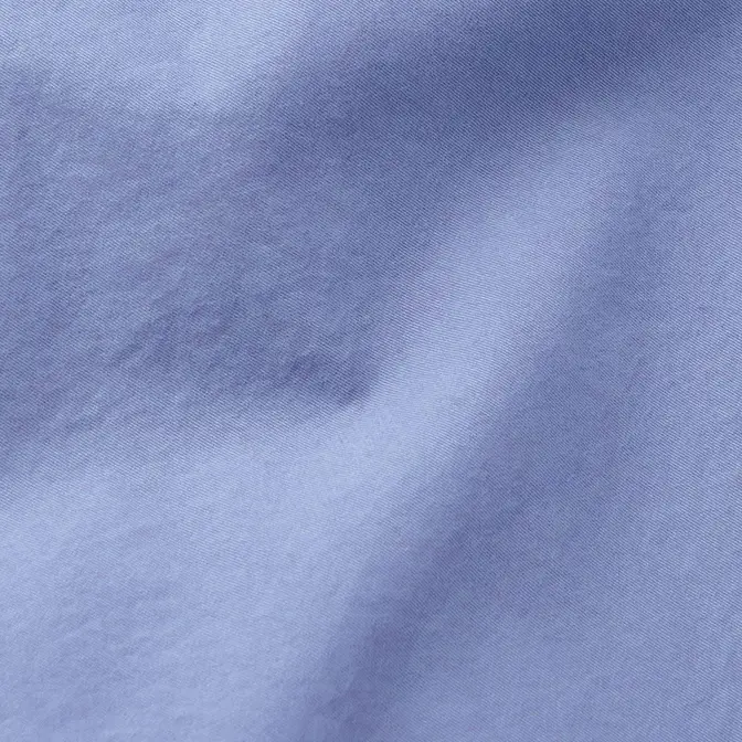 C P Company Logo Appliquéd Cotton Gabardine Jacket Blue Texture Closeup