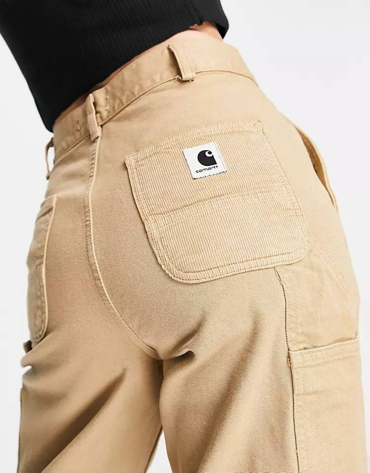 Carhartt WIP Medley Utility Trousers Dusty Beige Logo Back Pocket Closeup