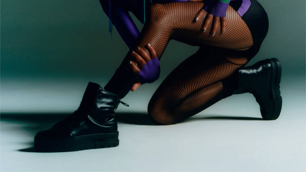 DUA LIPA x PUMA Mayze Boot Black 388611-01 on feet