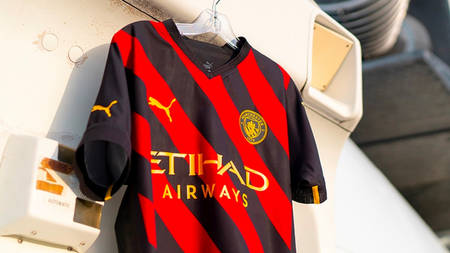 Manchester City Debuts Its Red and Black 2022/23 Away Kit Manchester City Debuts Its Red and Black 2022/23 Away Kit