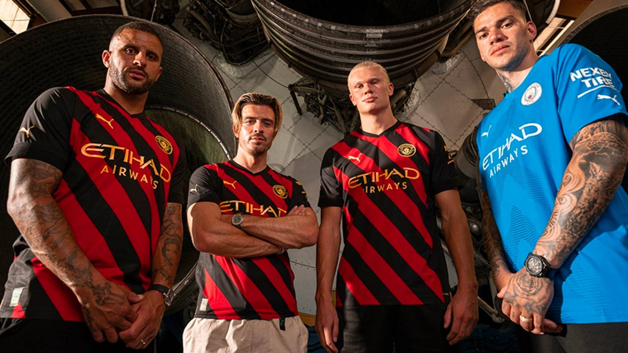 Manchester City Debuts Its Red and Black 2022/23 Away Kit