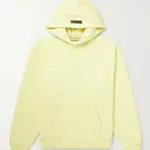 Fear of God ESSENTIALS Logo-Flocked Cotton-Blend Hoodie Canary