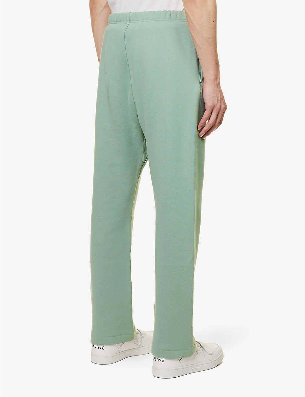 Fear of God ESSENTIALS Slim-Fit Tapered Logo-Flocked Cotton-Blend Sweatpants Sycamore Back