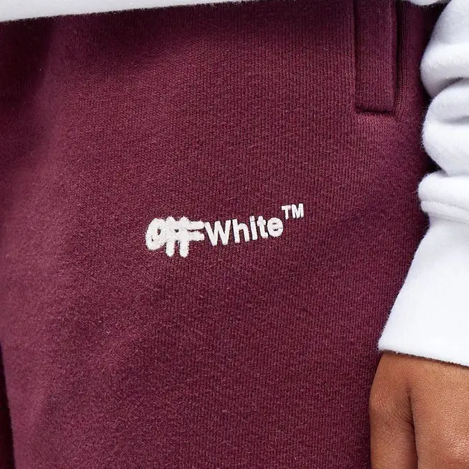 Off White Spray Logo Cuffed Sweat Pant Burgundy White Logo Closeup