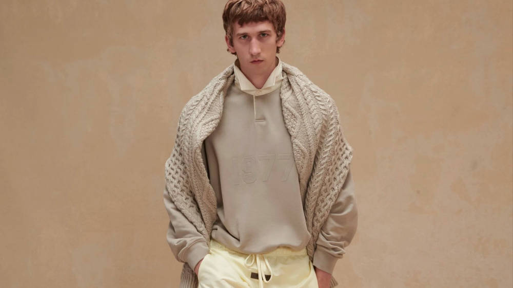 Image via Fear of God ESSENTIALS Layer Up in Style With These Essential Knitwear Pieces Available at MR PORTER