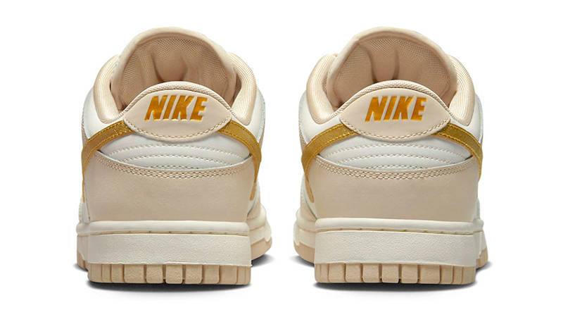 nike dunks gold swoosh