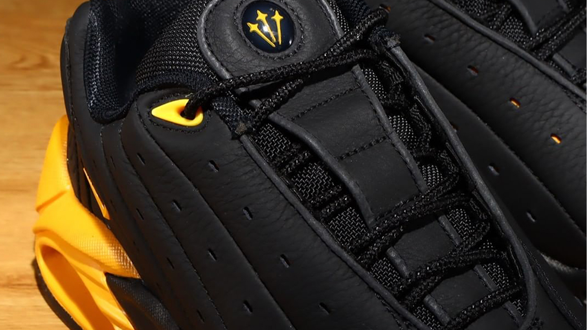 NOCTA x Nike Hot Step Air Terra Black University Gold