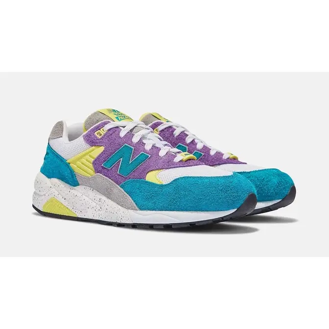 New Balance Hombre FuelCell Rebel v3 in Gris Roja Azul Balance 580 Teal Purple Front