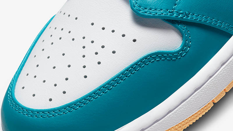 white and teal jordans 1