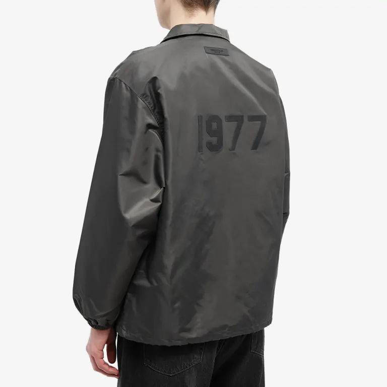 Fear of God Essentials 1977 Nylon Coaches Jacket Off Black Backside
