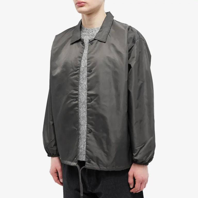 Fear of God Essentials 1977 Nylon Coaches Jacket Off Black Front