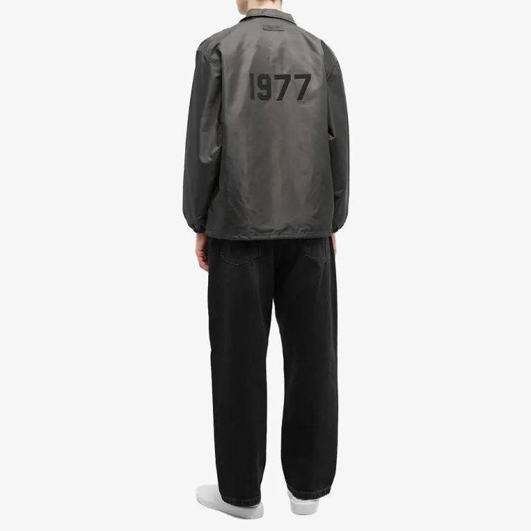 Fear of God Essentials 1977 Nylon Coaches Jacket Off Black Full Image