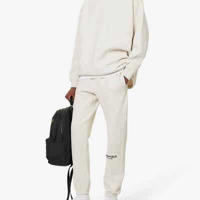 Fear of God ESSENTIALS Jogging Bottoms - Light Oatmeal | The Sole Supplier