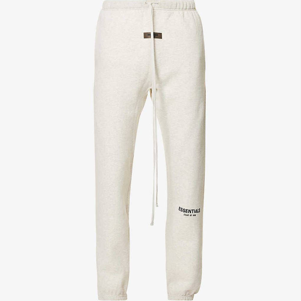 Fear of God ESSENTIALS Jogging Bottoms - Light Oatmeal | The Sole Supplier