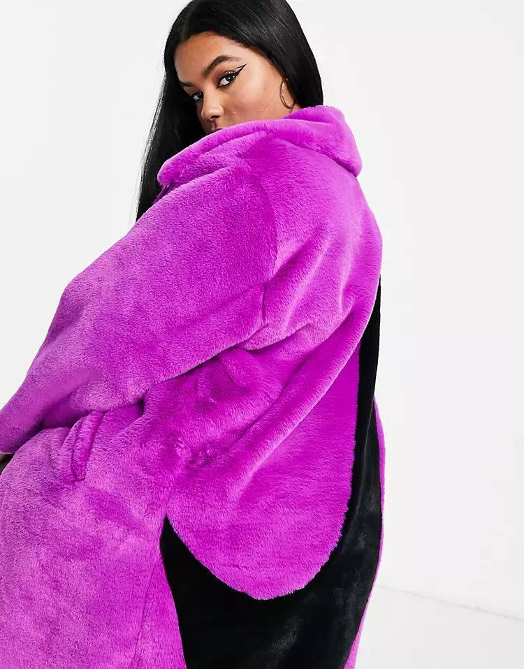 nike faux fur oversized swoosh jacket in purple