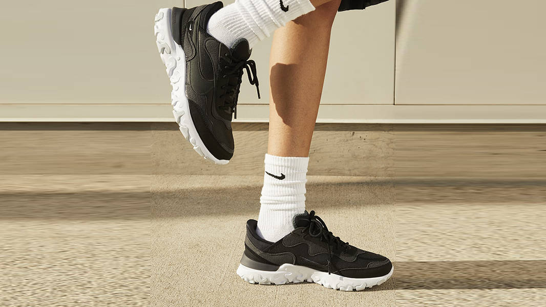 Nike React Revision Black White DQ5188-001 on feet