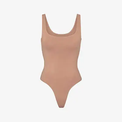 Skims Smoothing Scoop Neck Stretch Woven Thong Body Sienna Feature