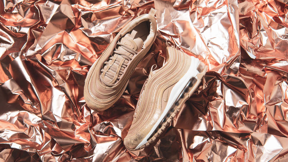 Image via The Sole Supplier Metallic Gold Details Elevate the Nike Air Max 97 "Distressed Tan"