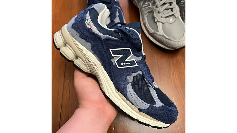 New Balance 2002R Protection Pack Navy Grey Side