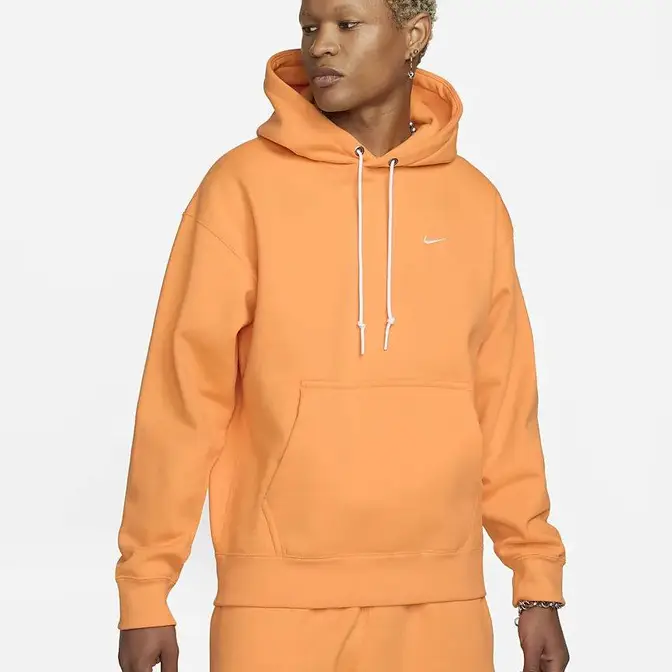 Nike Solo Swoosh Fleece Pullover Hoodie Vivid Orange Feature