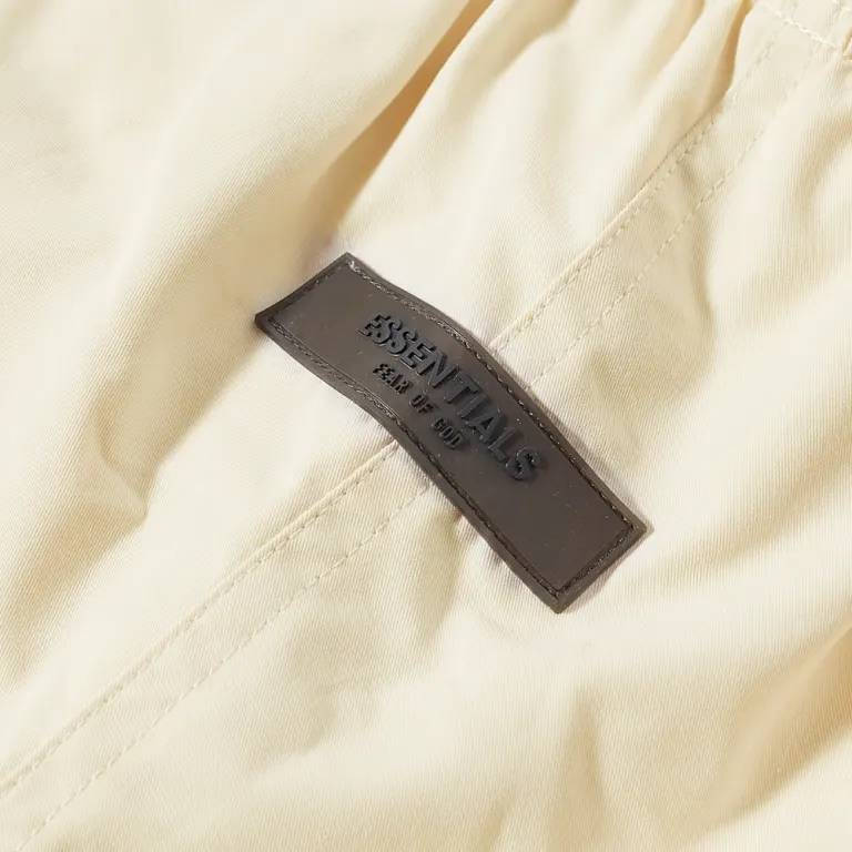 Fear of God ESSENTIALS Logo Dock Shorts Egg Shell logo
