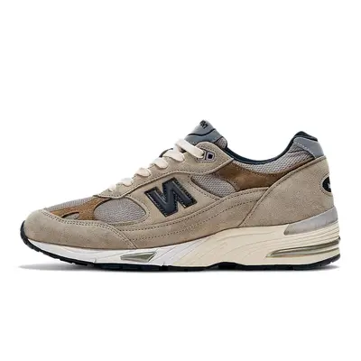 is back with another New Balance collaboration and this time around Grey Brown Womens W991JJA