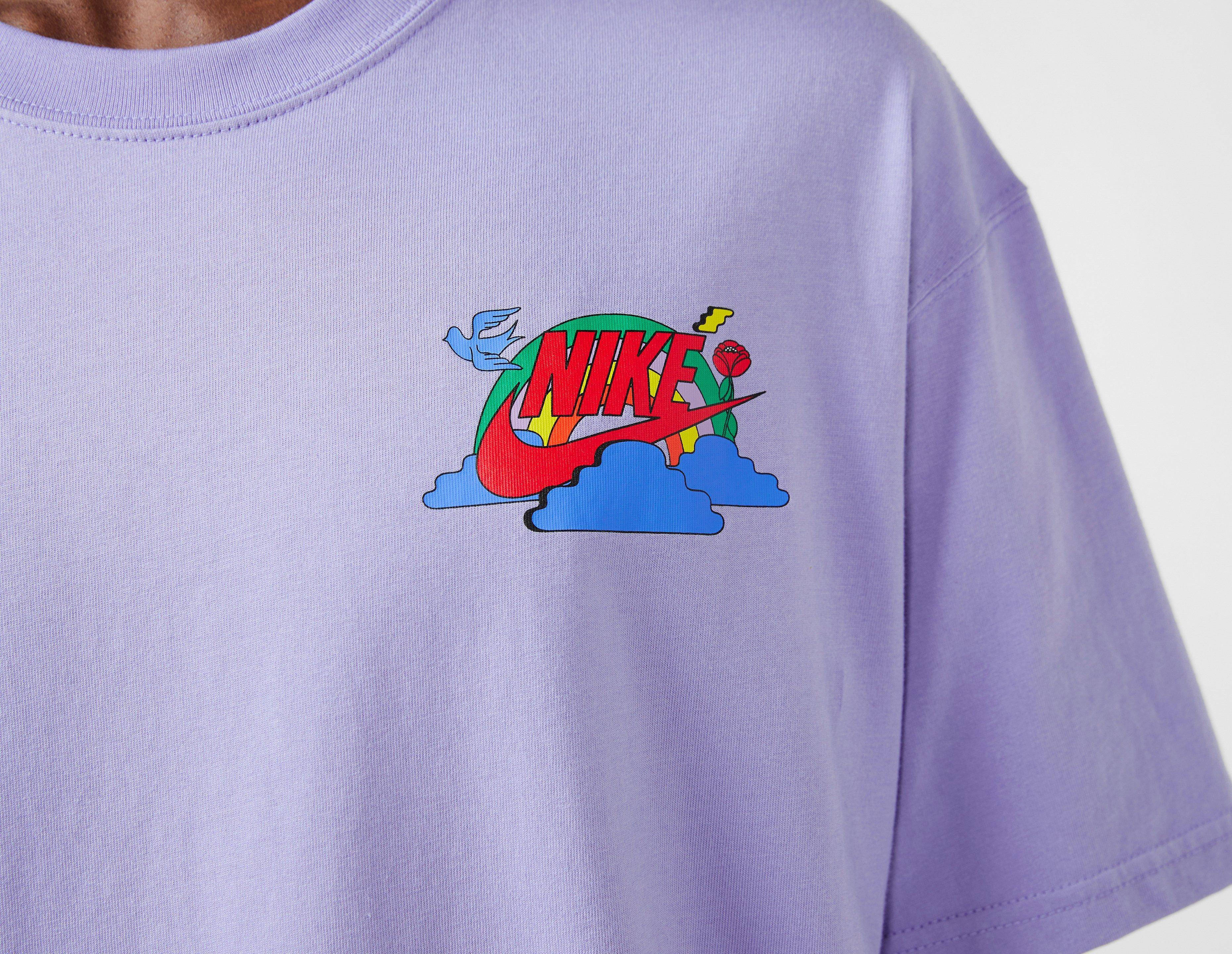 purple and turquoise nike shirt