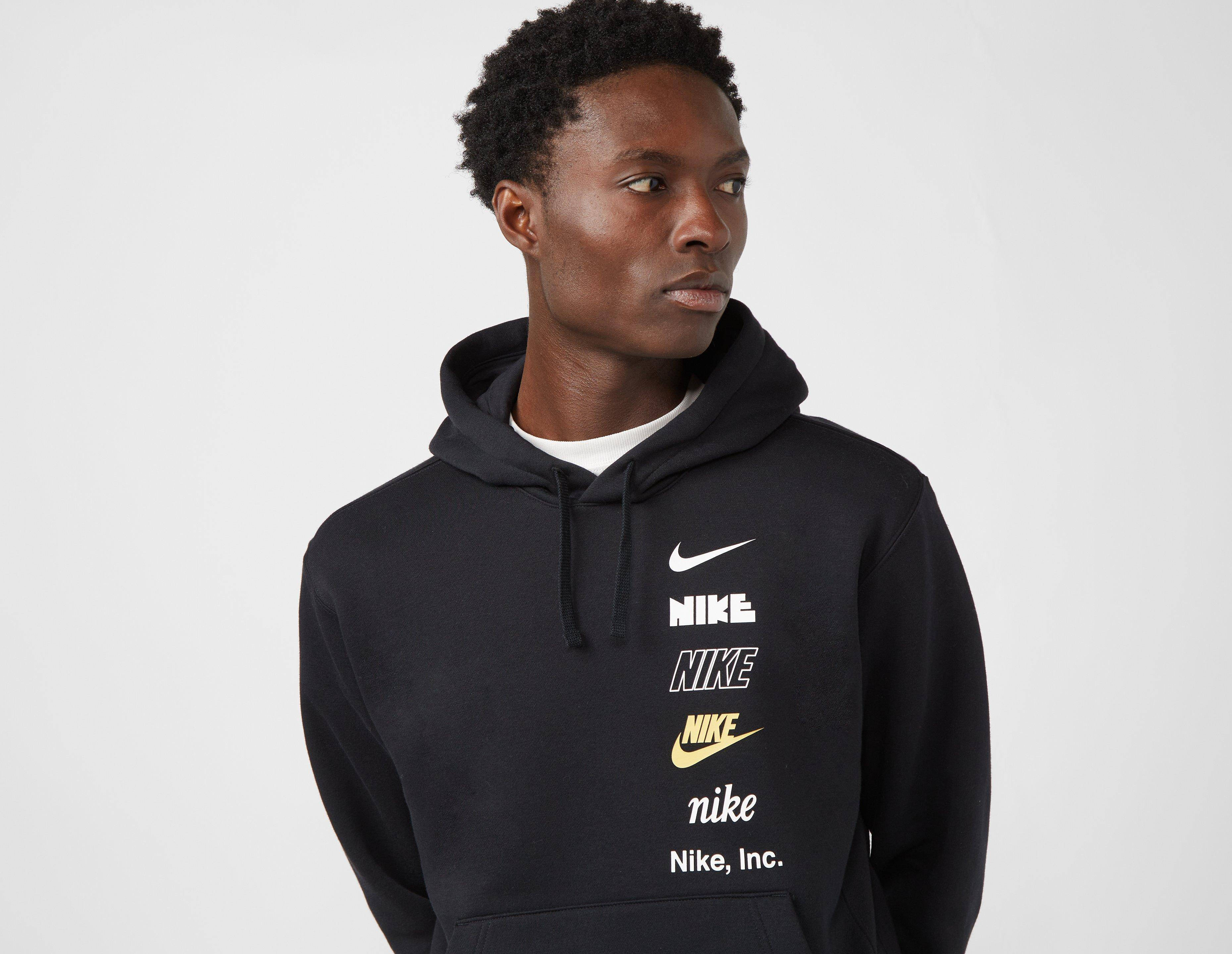 nike hoodie with a bunch of nike symbols