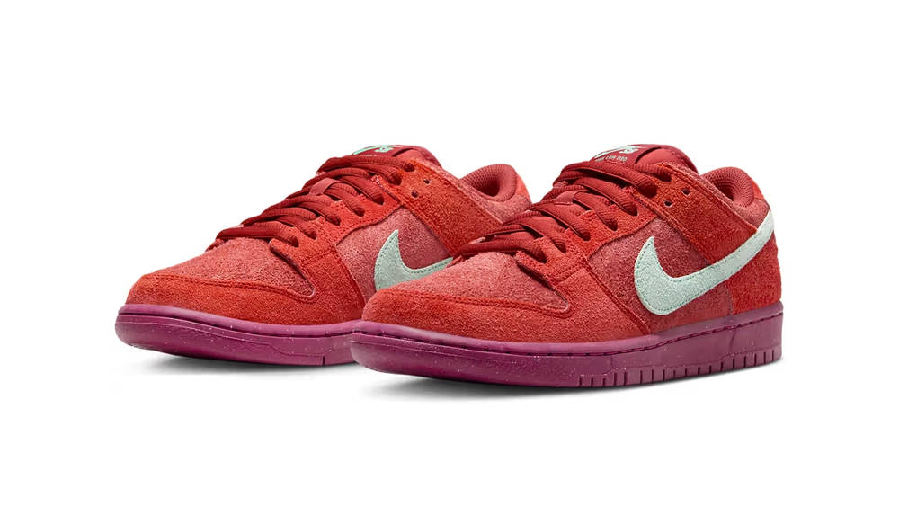 Image via Nike Shaggy Suede Uppers Decorate the Nike SB Dunk Low "Mystic Red"