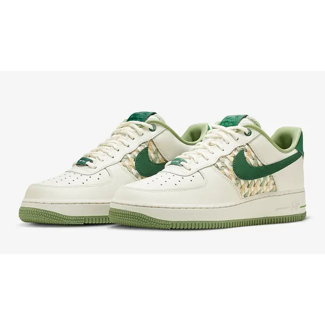 A Neon Green Leather Covers The Nike Air Force 1 Low •