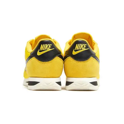 nike cortez yellow and white