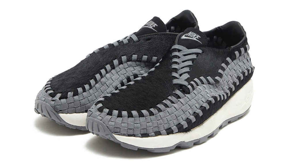 Image via JD Sports Nike Air Footscape Woven Black Grey