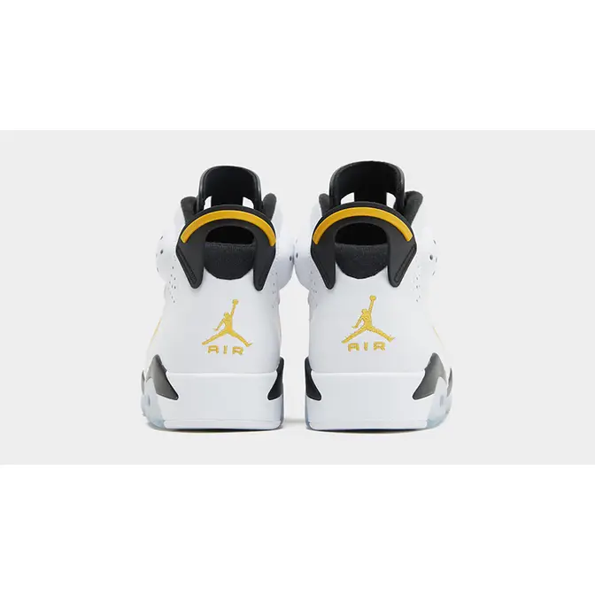 Black white yellow jordans best sale