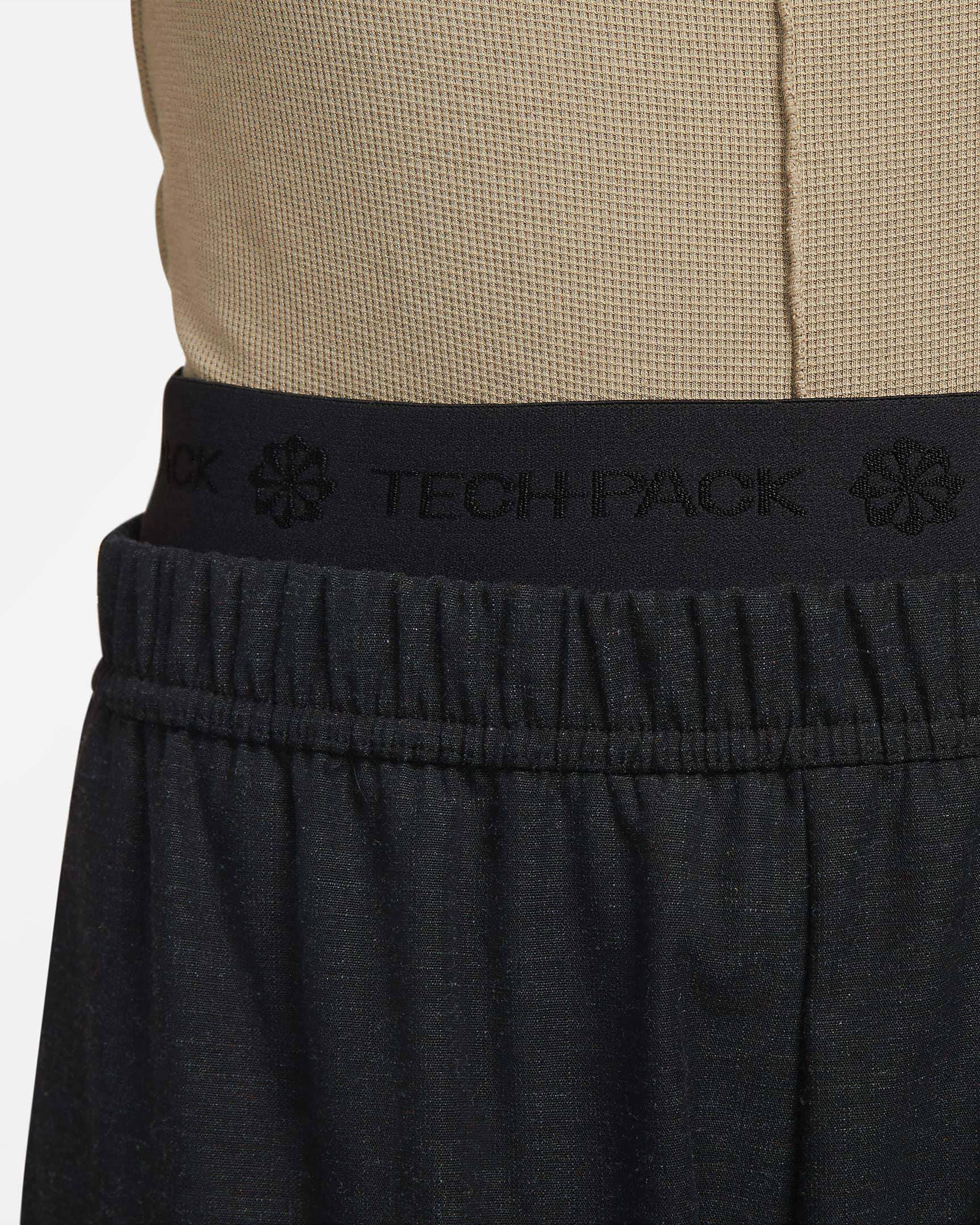 Nike Sportswear Tech Pack High-Waisted Wide-Leg Ripstop Trousers Black Heather Closeup 1
