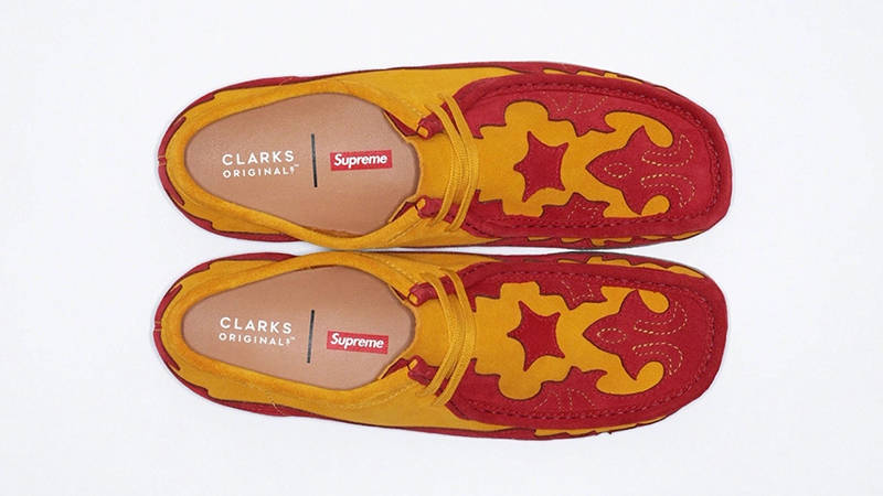 Supreme clarks hot sale red