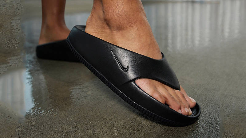 Nike Calm Flip Flop Black on foot