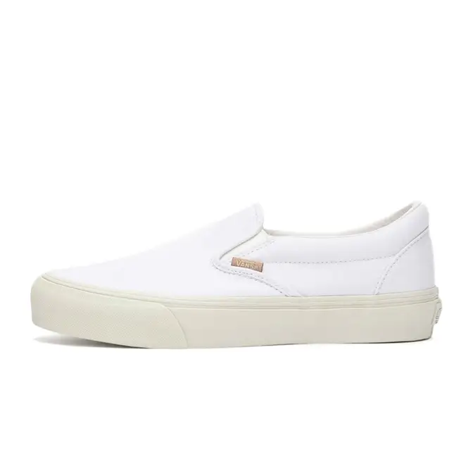 White classic deals vans slip ons