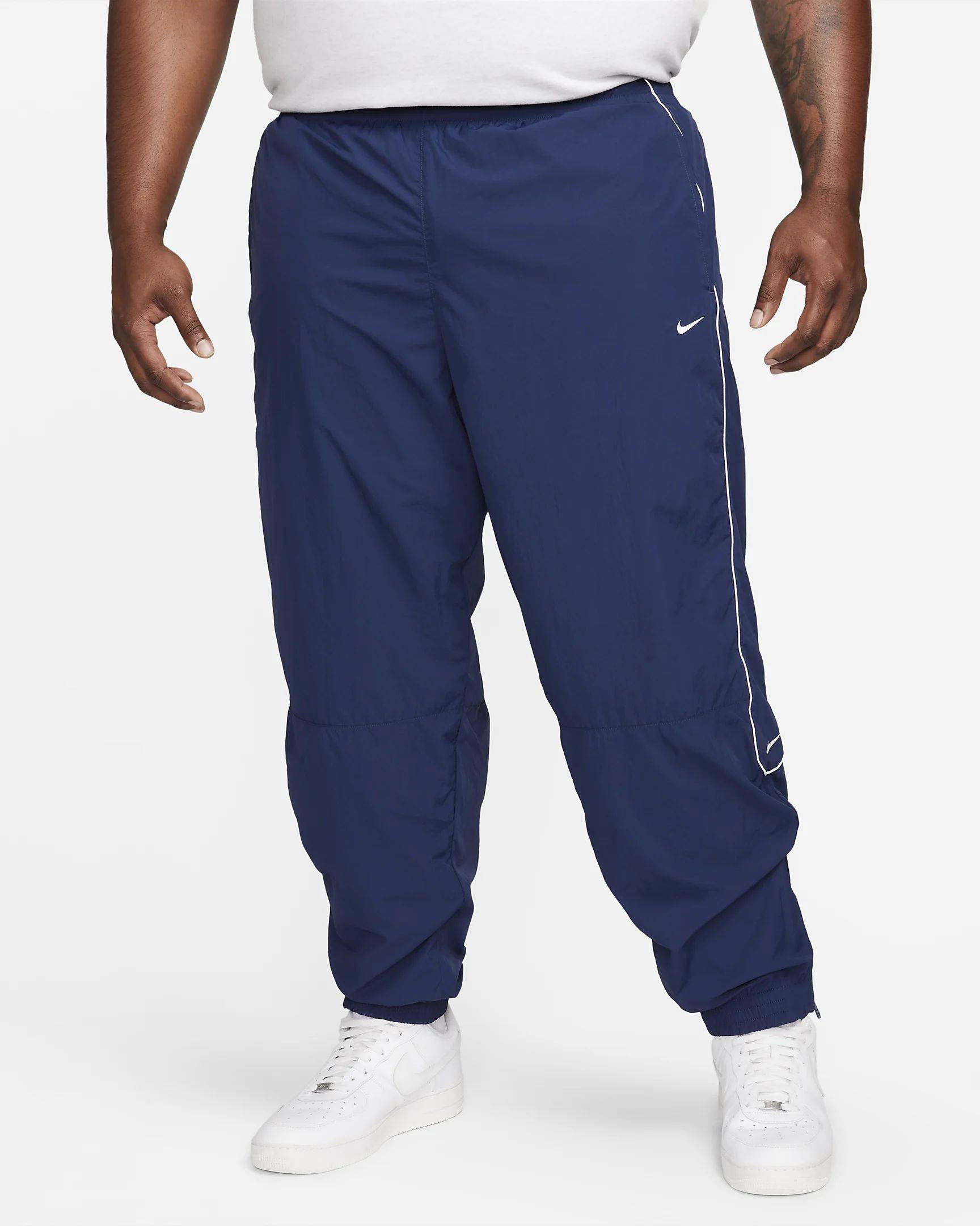nike navy tracksuit bottoms