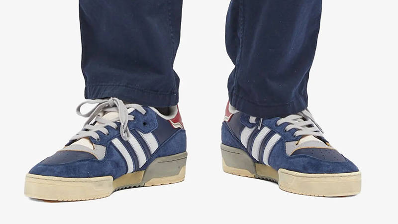 adidas Rivalry Low Extra Butter Navy White on foot