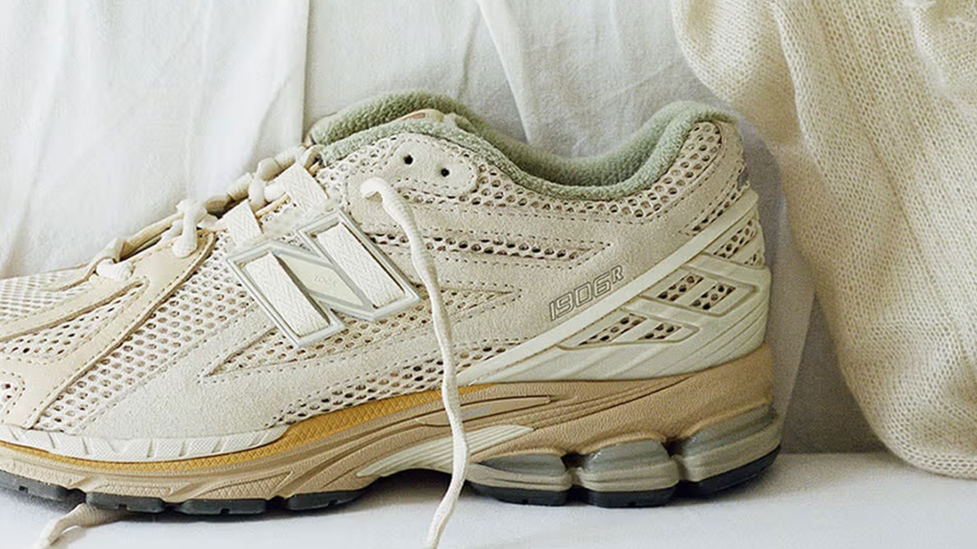AURALEE x New Balance 1906R Bone White Desert